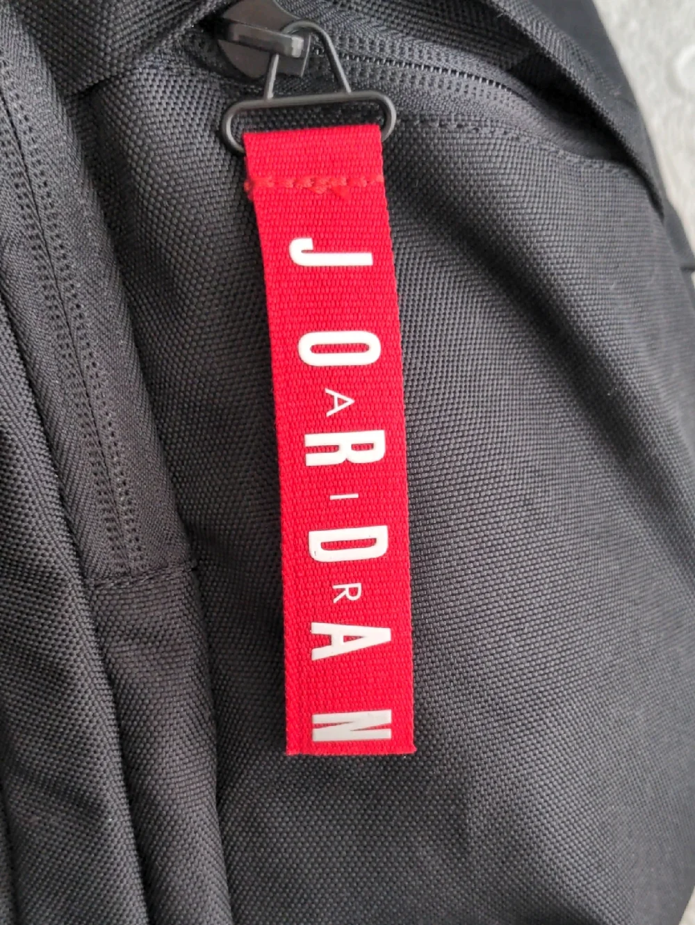 Jordan Patrol Black Backpack with White and Red Accents